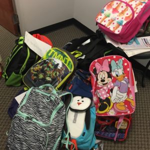 A sampling of the backpacks collected from NYSWI/SI members for Project Backpack.